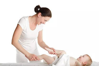 Woman massaging kid